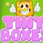 Žlutá usmívající se kostka s palci nahoru a fialový nápis Tiny Boxes na zeleném pozadí
