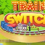 Barevný nápis Train Switch nad kulatou vlakovou tratí s budovami a vlakem, obklopenou stromy