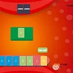 Stůl s kartami na světlém červeném pozadí s počítadly skóre a kartami v různých barvách