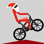 Postava v červeném oblečení a čepici Santa Clause jede na kole na šedém pozadí